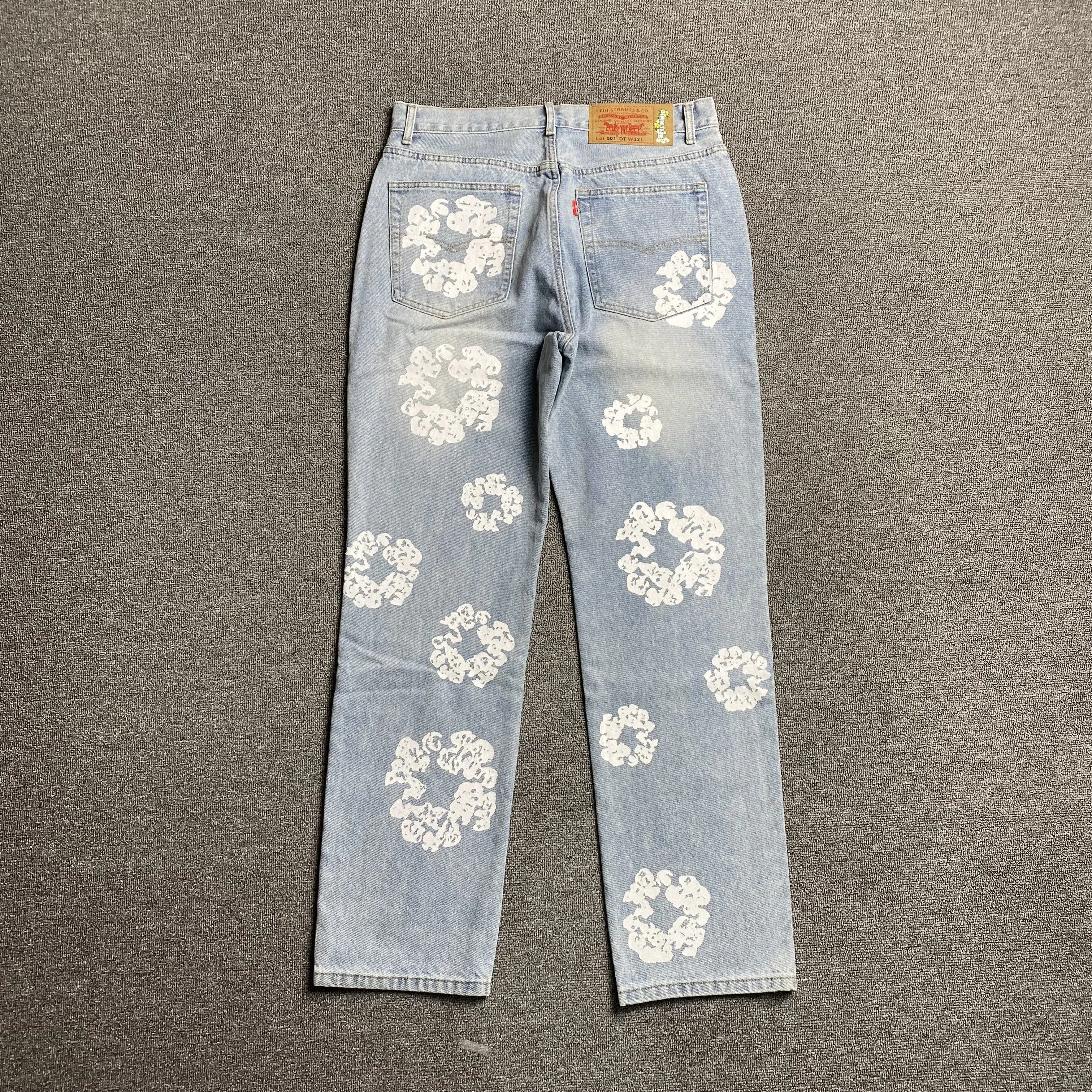 DENIM TEARS x LEVI'S COTTON WREATH JEANS LIGHT WASH