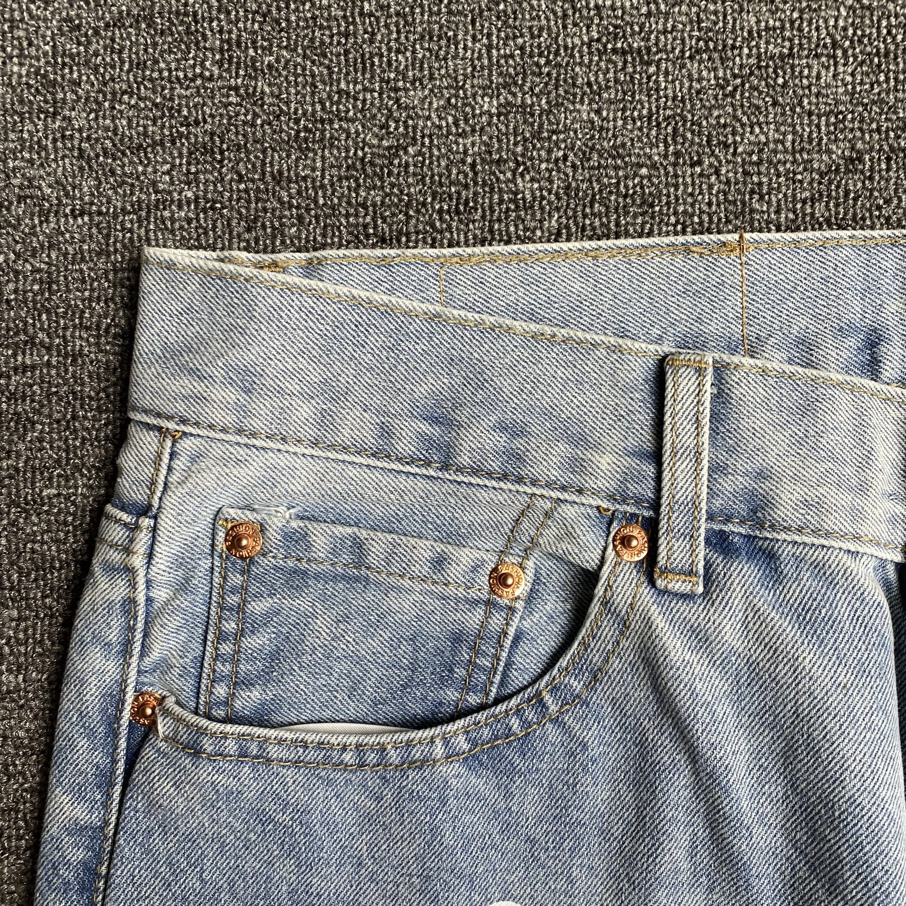 DENIM TEARS x LEVI'S COTTON WREATH JEANS LIGHT WASH