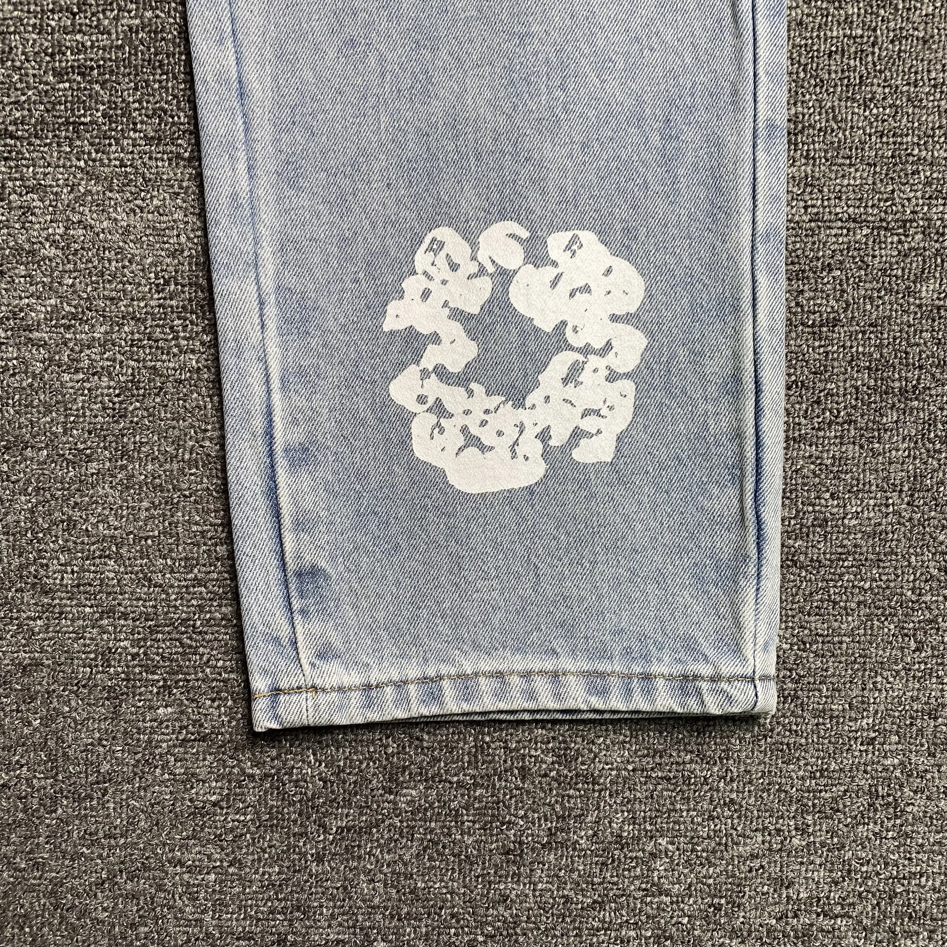 DENIM TEARS x LEVI'S COTTON WREATH JEANS LIGHT WASH