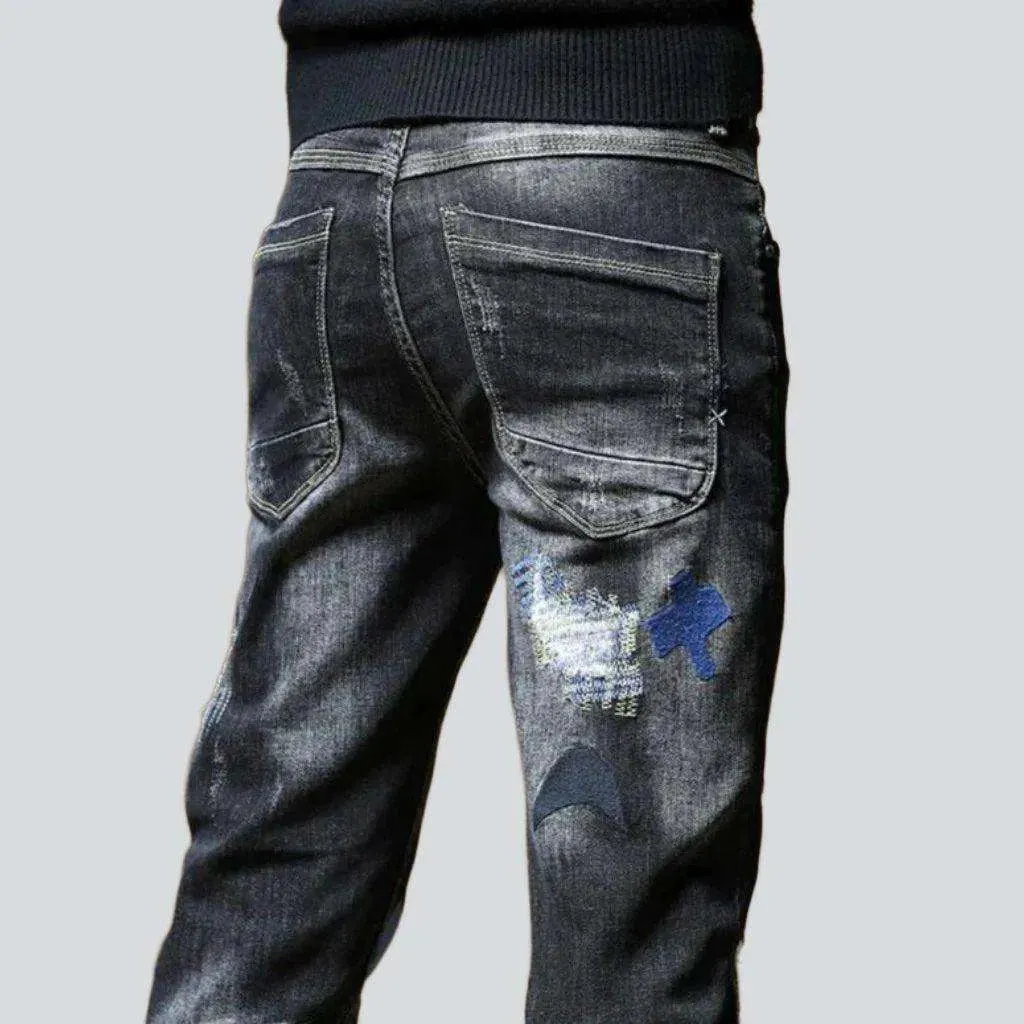 Embroidered destroyed skinny men's jeans