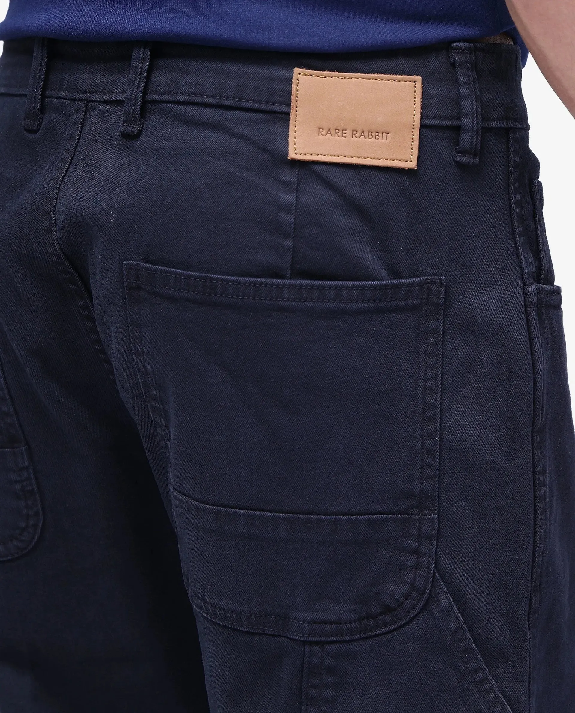 Rare Rabbit Men Arni Navy Cotton Viscose Garment Dyed Fabric Carpenter Fit Plain Denim Pant