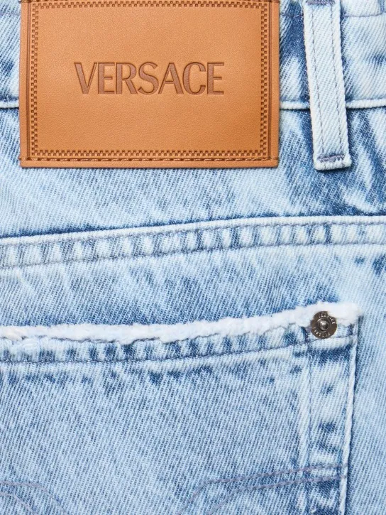 Versace   Stonewashed denim wide jeans 